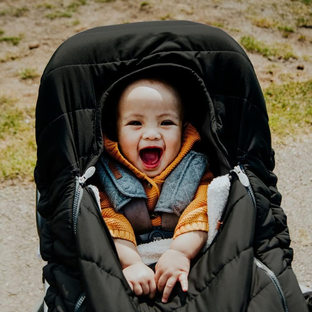 happy baby on the car seat